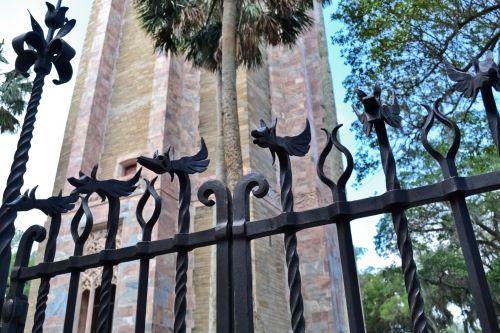 Detail of the artwork done in iron, along the top of the east gate to the bridge over the moat around Bok Tower, Florida.