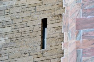 Slit window in coquina, Bok Tower, Florida.