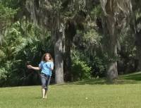 Lisa turning cartwheels at Bok Tower, Florida.