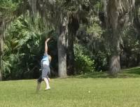 Lisa, turning cartwheels at Bok Tower, Florida.