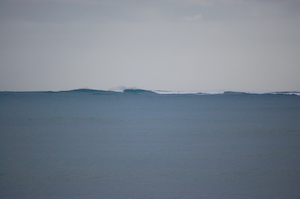 Spooky. Way the hell out there. How big? I do not know. Kaneohe Bay. Ride if you want, nobody will ever be out there to bother you. 